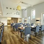 Hilton Garden Tivoli 4*